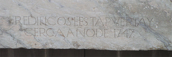 Inscripcion del muro del Palacio de Montenegro.